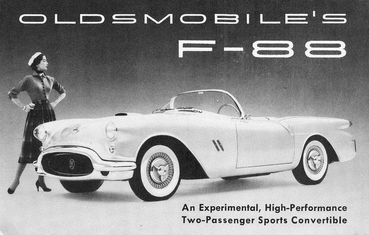 Historisk reklamekort fra 1954 med Oldsmobile F-88. Originalt periodemateriale, ikke et moderne fotografi av den bevarte bilen.